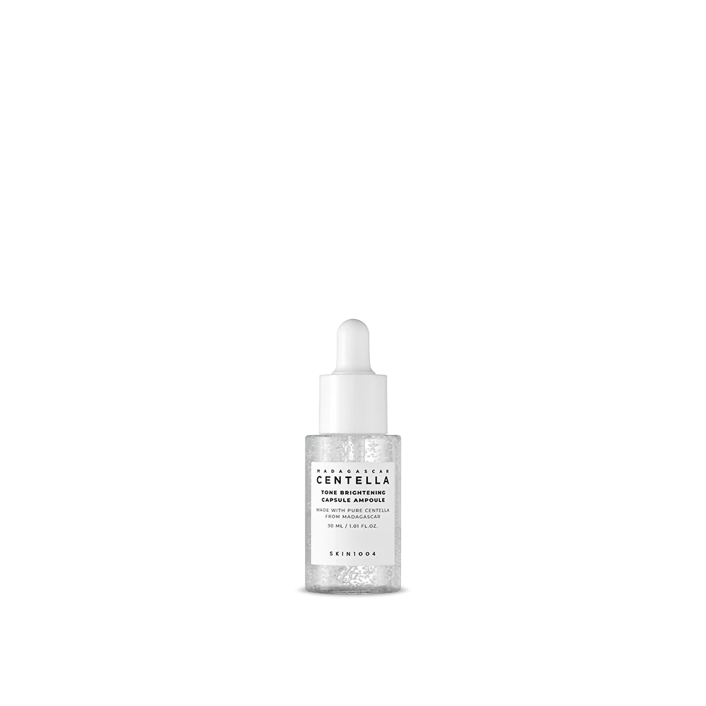 skin1004-ampoule-serum-30ml-tone-brightening-capsule-ampoule-40753987485942_1440x SUERO FACIAL ANTI-MANCHAS SKIN1004 MADAGASCAR CENTELLA TONE BRIGHTENING CAPSULE AMPOULE - Imagen 1